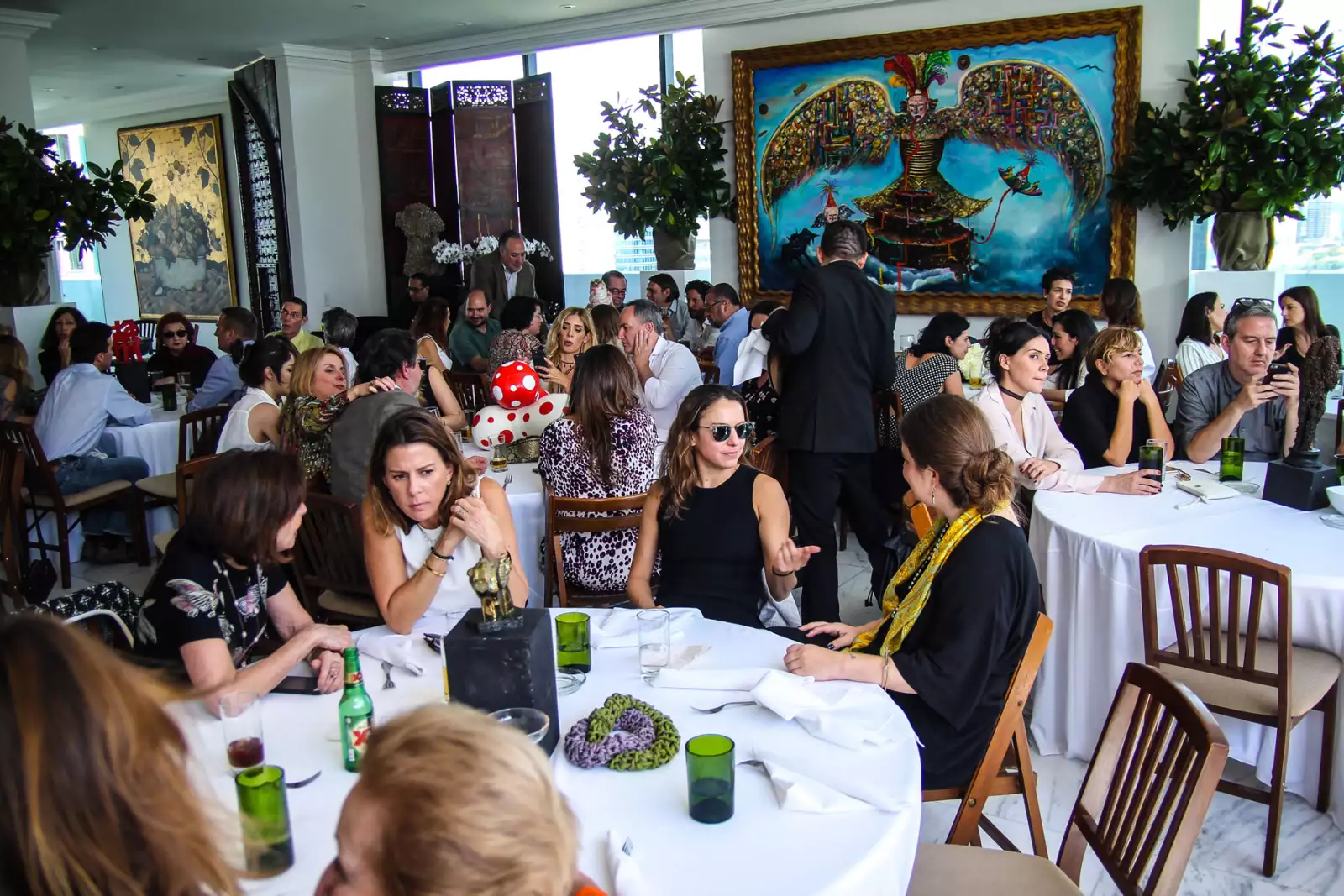 Comida de los patronos de arte de la Bienal