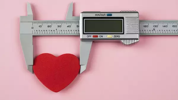 Digital caliper and red heart shape