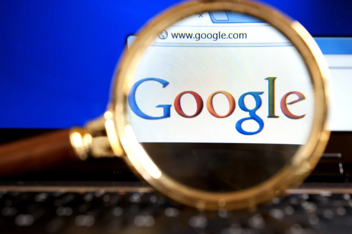 Google website through a magnifying glass
