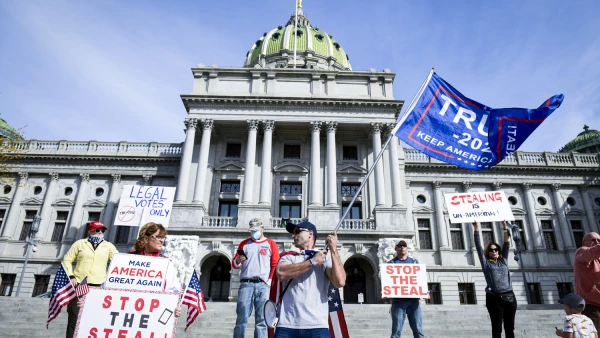 Supporters of U.S. President Donald Trump protest in front of the Pennsylvania Commonwealth capitol building in Harrisburg
