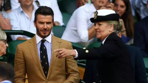 El exfutbolista asistió acompañado de su mamá al Grand Slam.