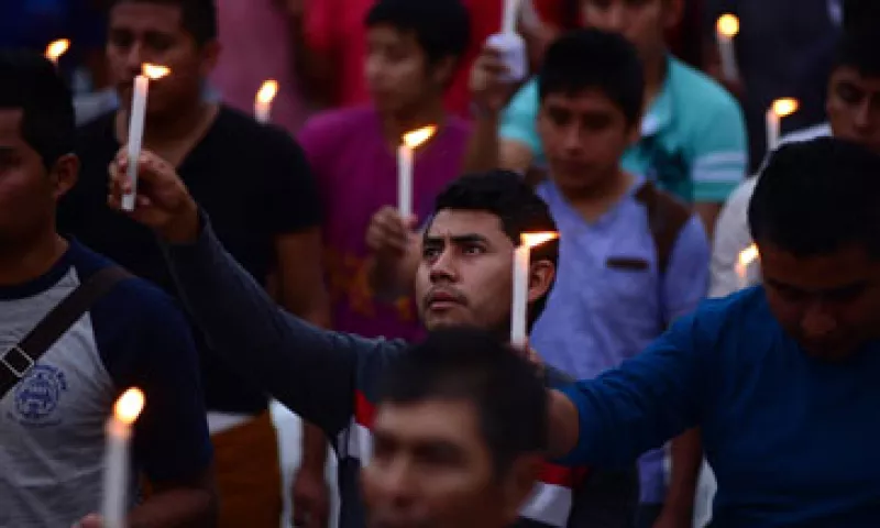 Los padres de los 43 normalistas acudieron a una misa en la parroquia de San Gerardo, en Iguala, donde anunciaron recorridos en colonias del municipio. (Foto: Cuartoscuro )