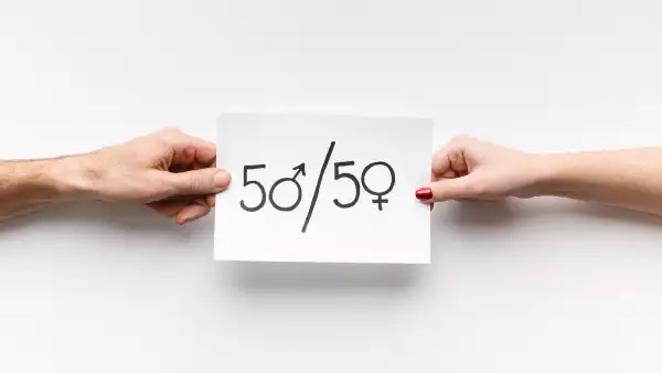 Text 50/50 written on piece of paper