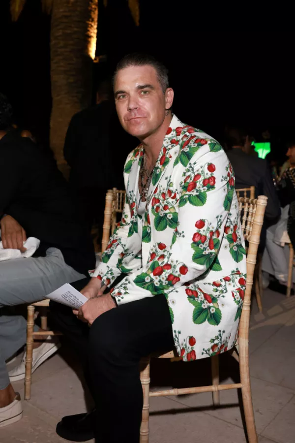 ?url=https%3A%2F%2Fcdn 3.expansion.mx%2Fa3%2F97%2F6603326740198ec0bba322985232%2Fgettyimages 1410538346 - Robbie Williams supera récord de Elvis Presley