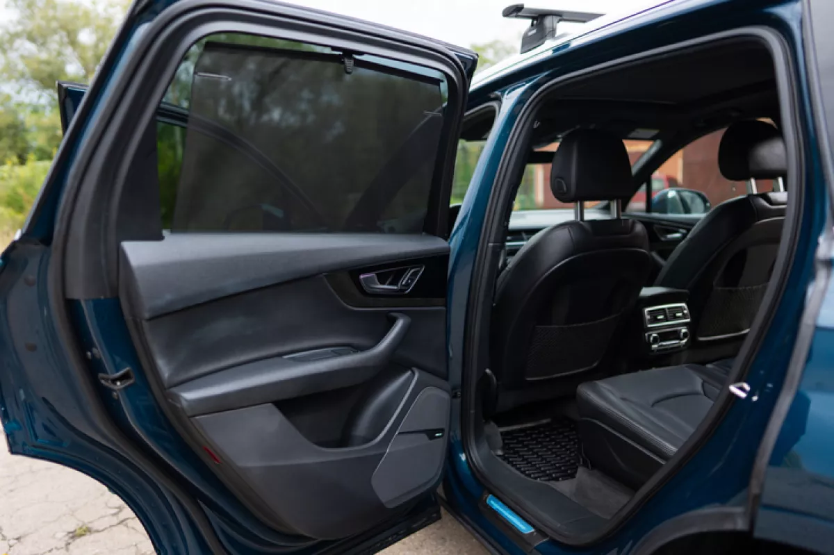 Automobile being opened.