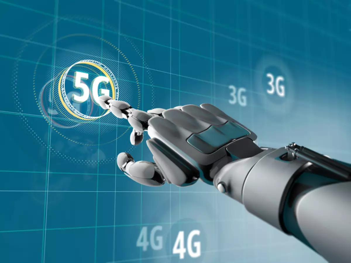A robotic hand pick on a symbol of 5G on Sci-fi interface with HUD elements. Futuristic concept of wireless communication