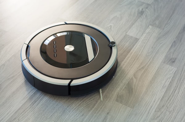 robotic vacuum cleaner on laminate wood floor smart cleaning tec