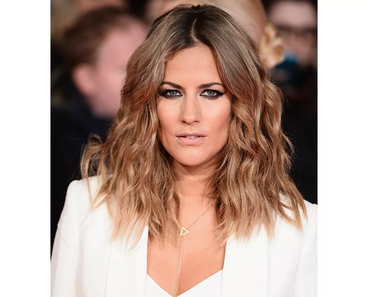 Caroline Flack fue relacionada a Harry tras una fiesta de X Factor en la que parecieron entenderse muy bien.
