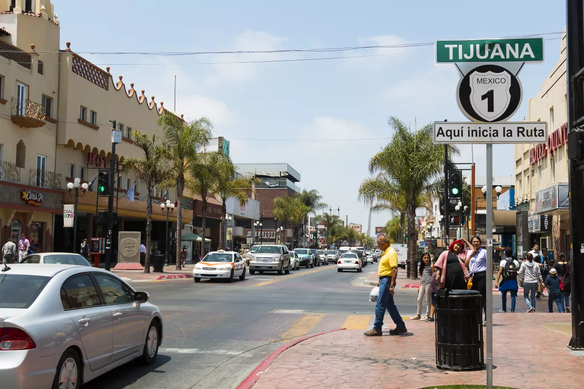 People Walk Along Avenida Revolucion in Tijuana, Mexico
