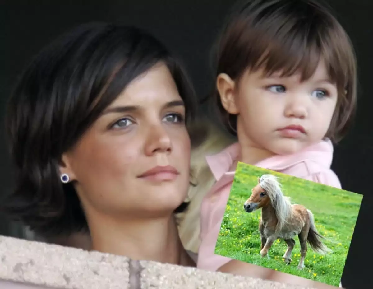 Katie Holmes y Tom Cruise hacen lo que sea con tal de complacer a su pequeña Suri. Aquí cuando tenía un año.