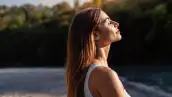 Young,Woman,With,Long,Hair,Enjoying,Sun,With,Closed,Eyes