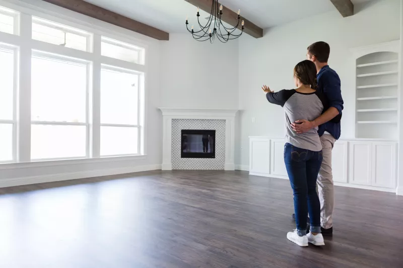Young couple plan home decor in new home