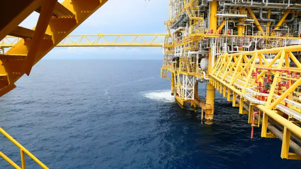 Offshore construction platform for production oil and gas. Oil and gas industry and hard work industry. Production platform and operation process by manual and auto function from control room.