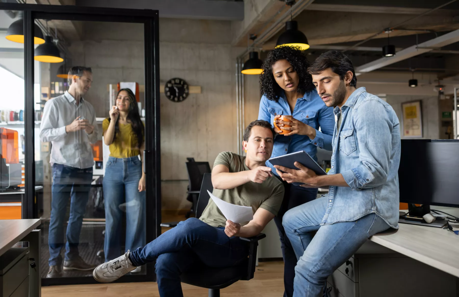 Group of workers working at a creative office