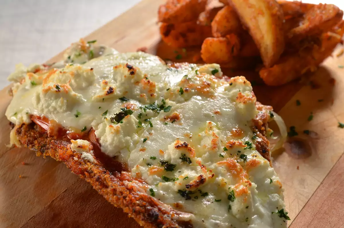 Milanesa de Cuatro Quesos del menú de Cavoli