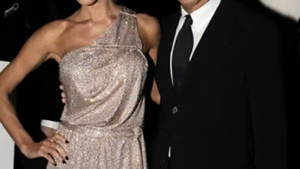 Victoria Beckham y Giorgio Armani