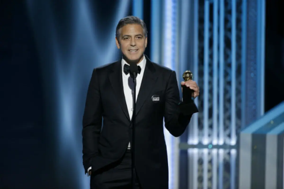 George Clooney, Amal Clooney y el compositor francés Alexandre Desplat.