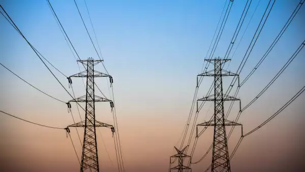 Couple Electricity pylon at sunset