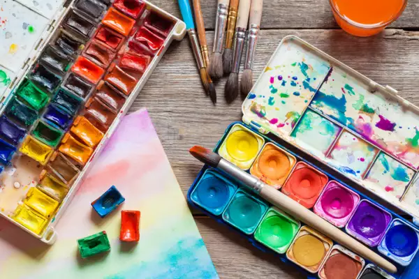 Set of watercolor paints, brushes for painting
