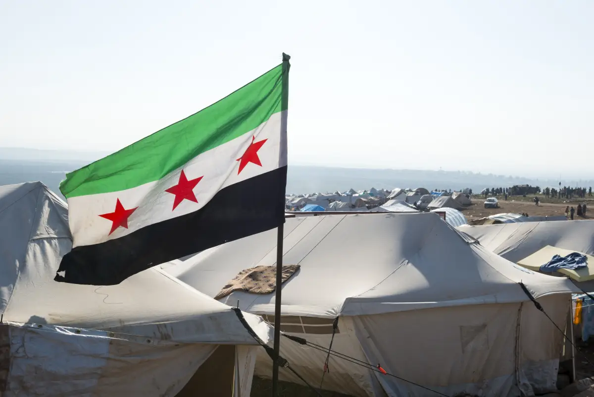 Free Syrian flag in refugee camp (Atmeh, Syria)