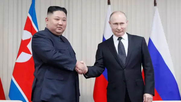 Vladimir Putin y Kim Jong Un