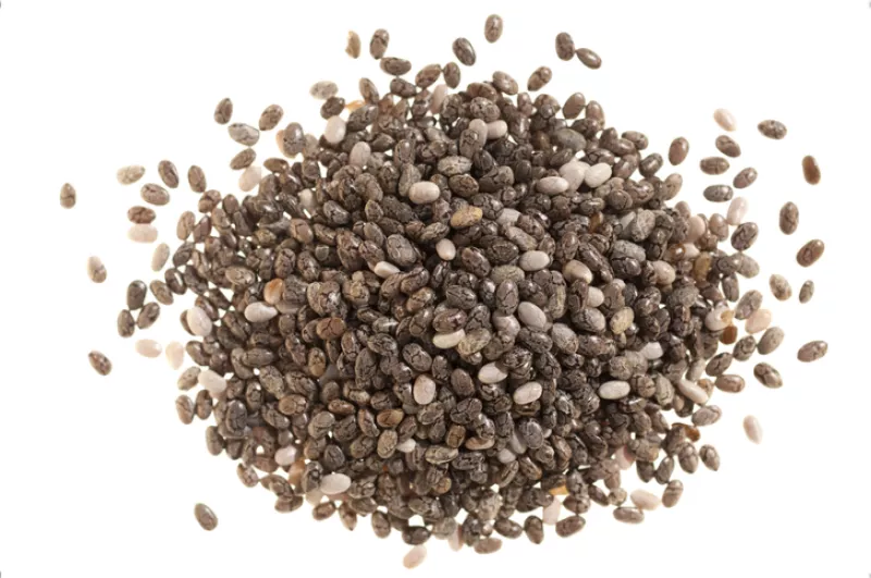 Pile of chia seeds on white