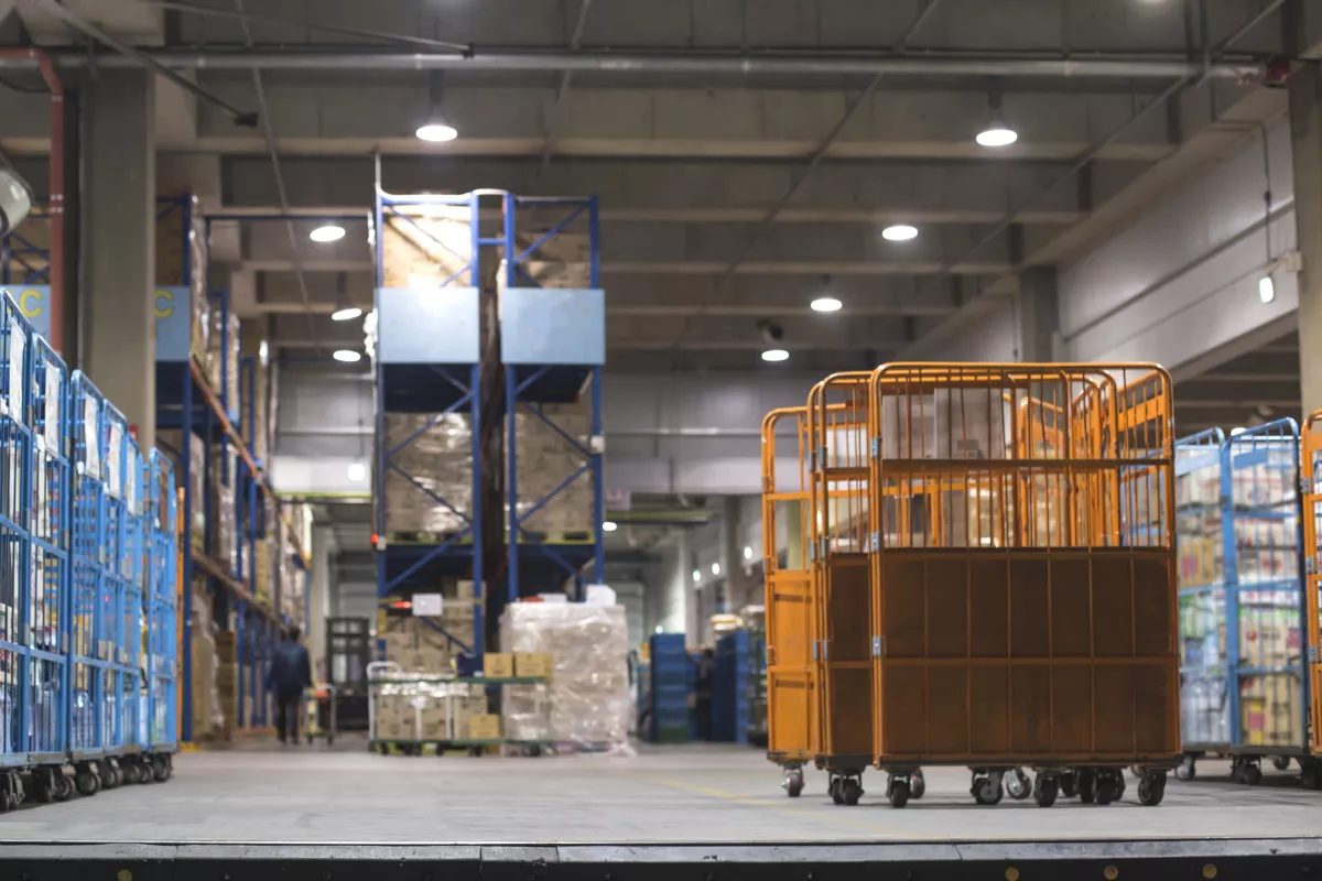 Modern warehouse with stack of cartons