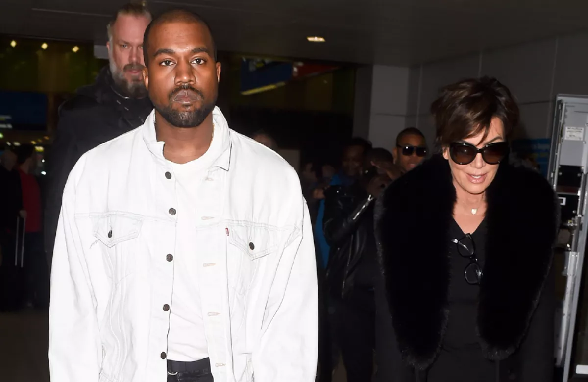 Kanye West And Kris Jenner arrive at charles de gaulle airport for paris fashion week