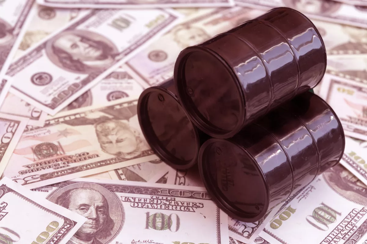 Barrels of oil, American dollar bills.