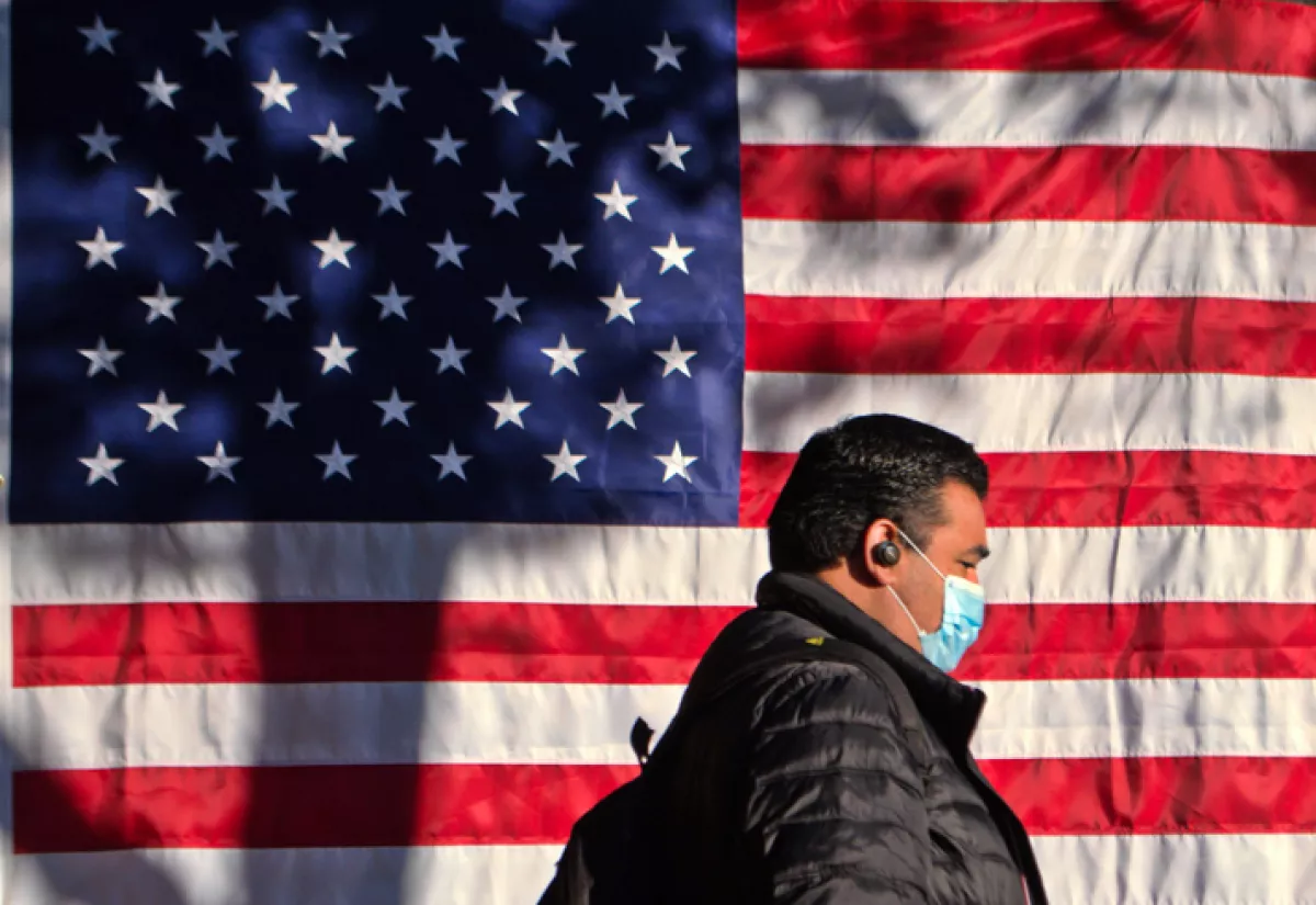 Coronavirus in the USA Person With Face Mask in Public Streets Social Distance