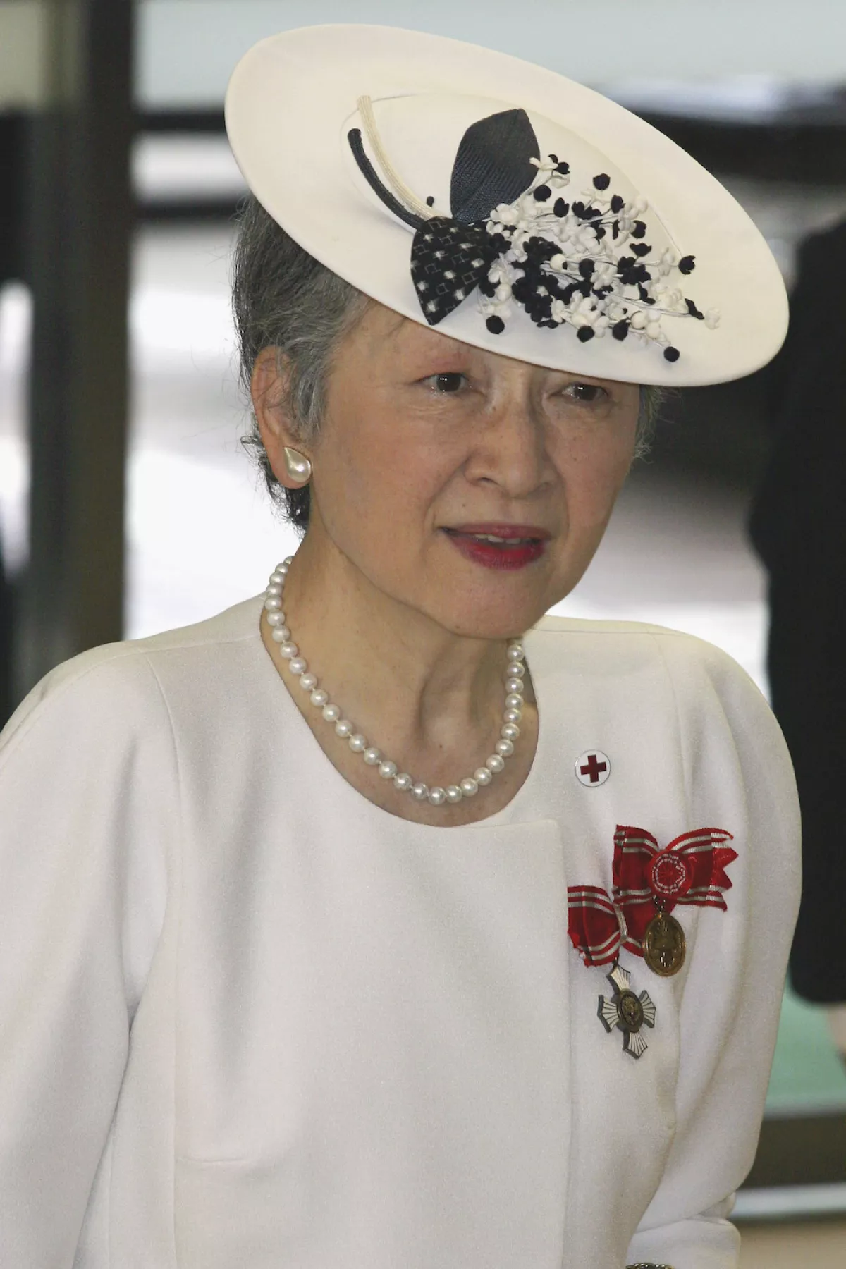 Empress Michiko Arrives At The Japanse Red Cross Society Meeting