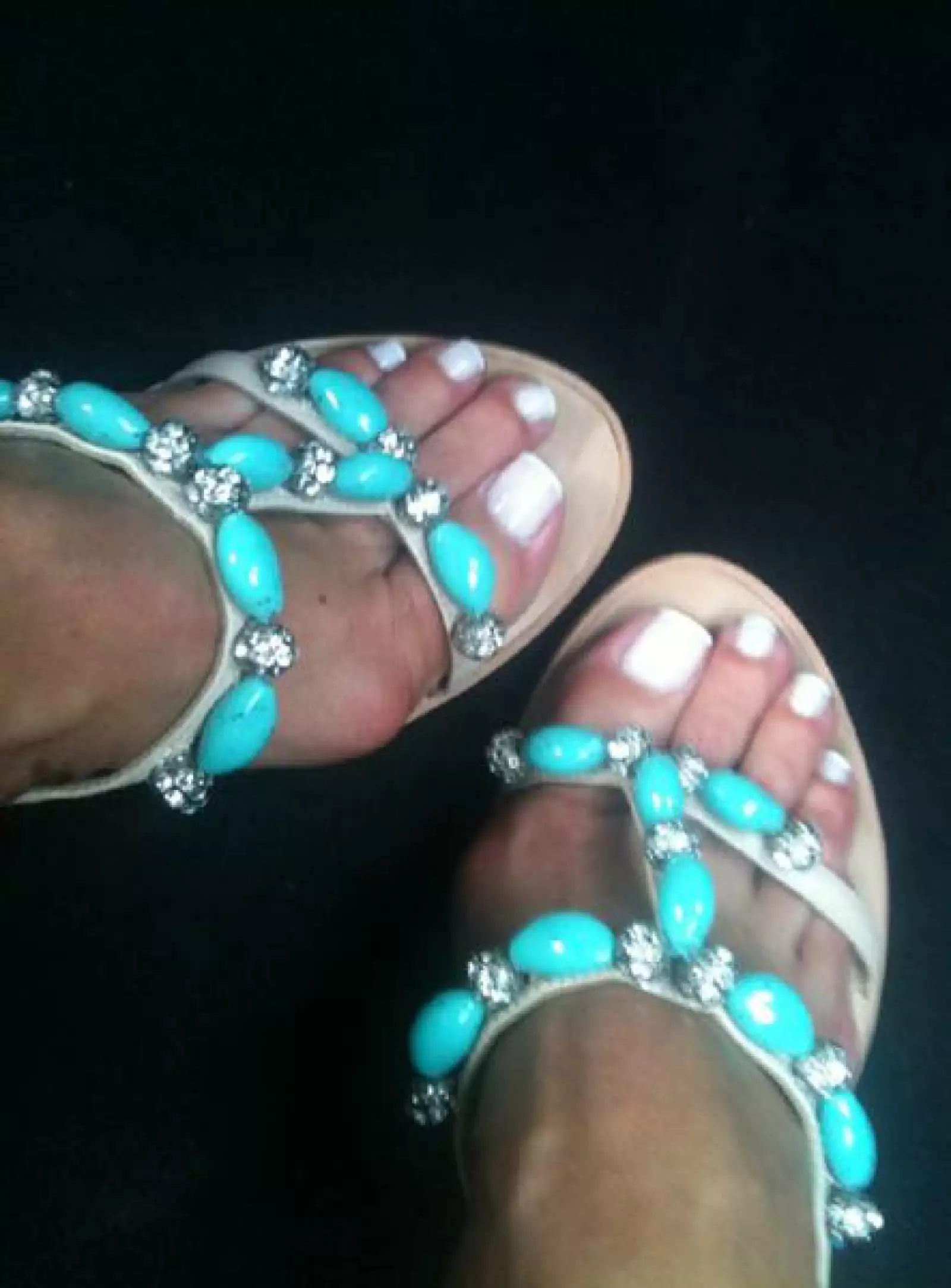 La cantante también tiene zapatos con detalles muy femeninos.