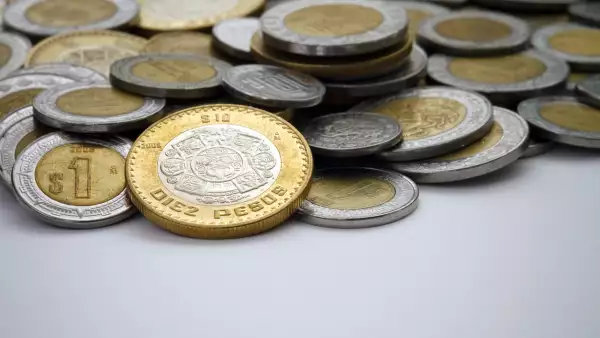 Ten Mexican Peso Coin Spot Lit Among Other Pesos dinero economia monedas divisas