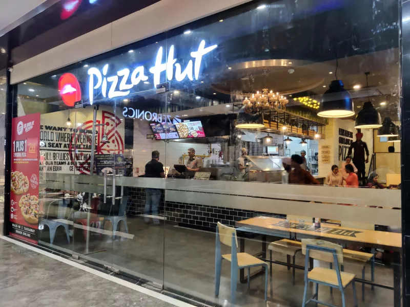 Pizza Hut prueba nuevos formatos de restaurantes. (Foto: Abhinav Mathur/Getty Images)