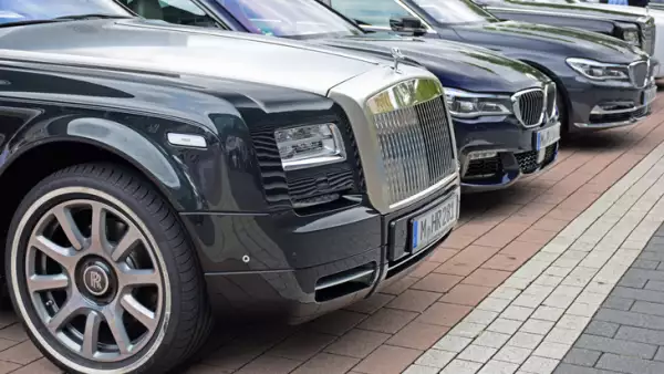 Rolls-Royce and BMW vehicles on the parking