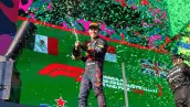 Sergio Perez of Mexico and Red Bull Racing celebrates on the