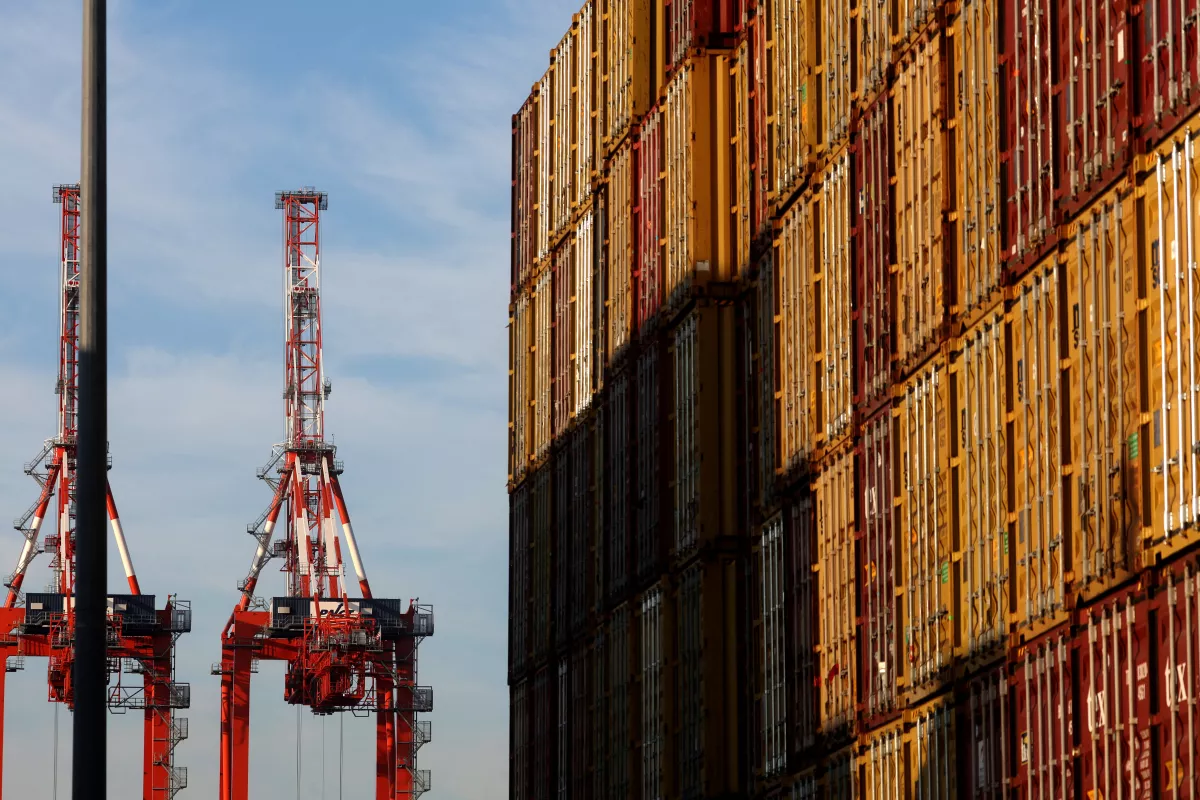 Containers and cranes are pictured after unionised dockworkers reached a tentative labour agreement in Newark