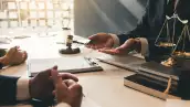 Lawyer give his customers signed a contract in the document. Consulting in regard to the various contracts