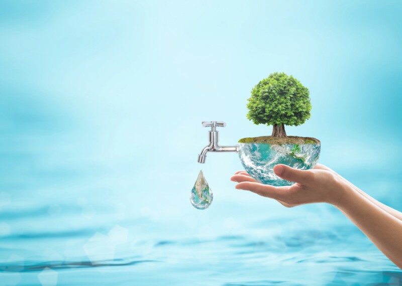 World environmental ecology concept with rain forest tree planting on green globe with water faucet. Element of the image furnished by NASA