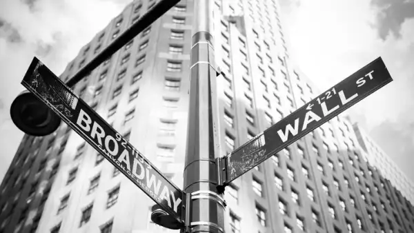 Wall Street and Broadway sign in Manhattan, New York.