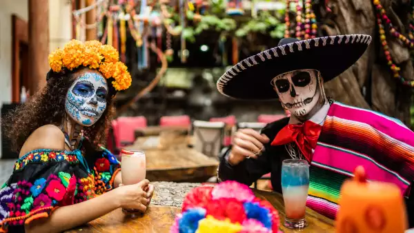 Portrait of a couple celebrating the day of the dead