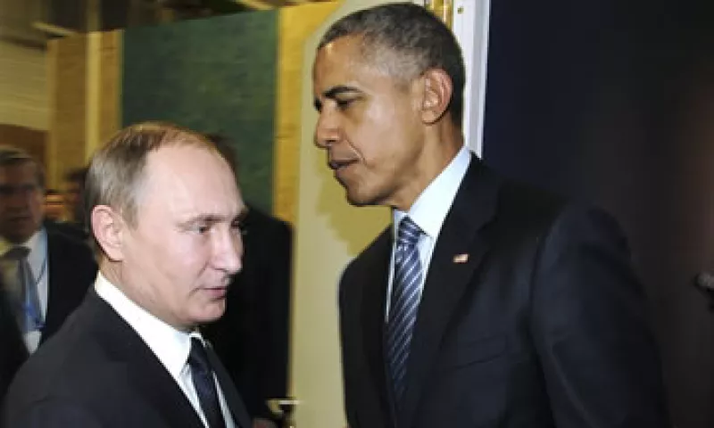 Putin (izq) y Obama se reunieron durante 30 minutos en París. (Foto: Reuters )