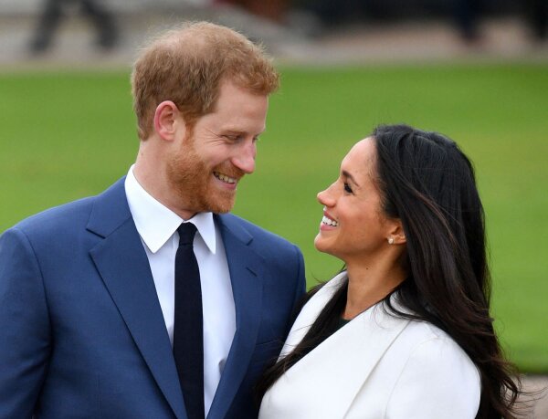 La actriz Meghan Markle y el príncipe Harry