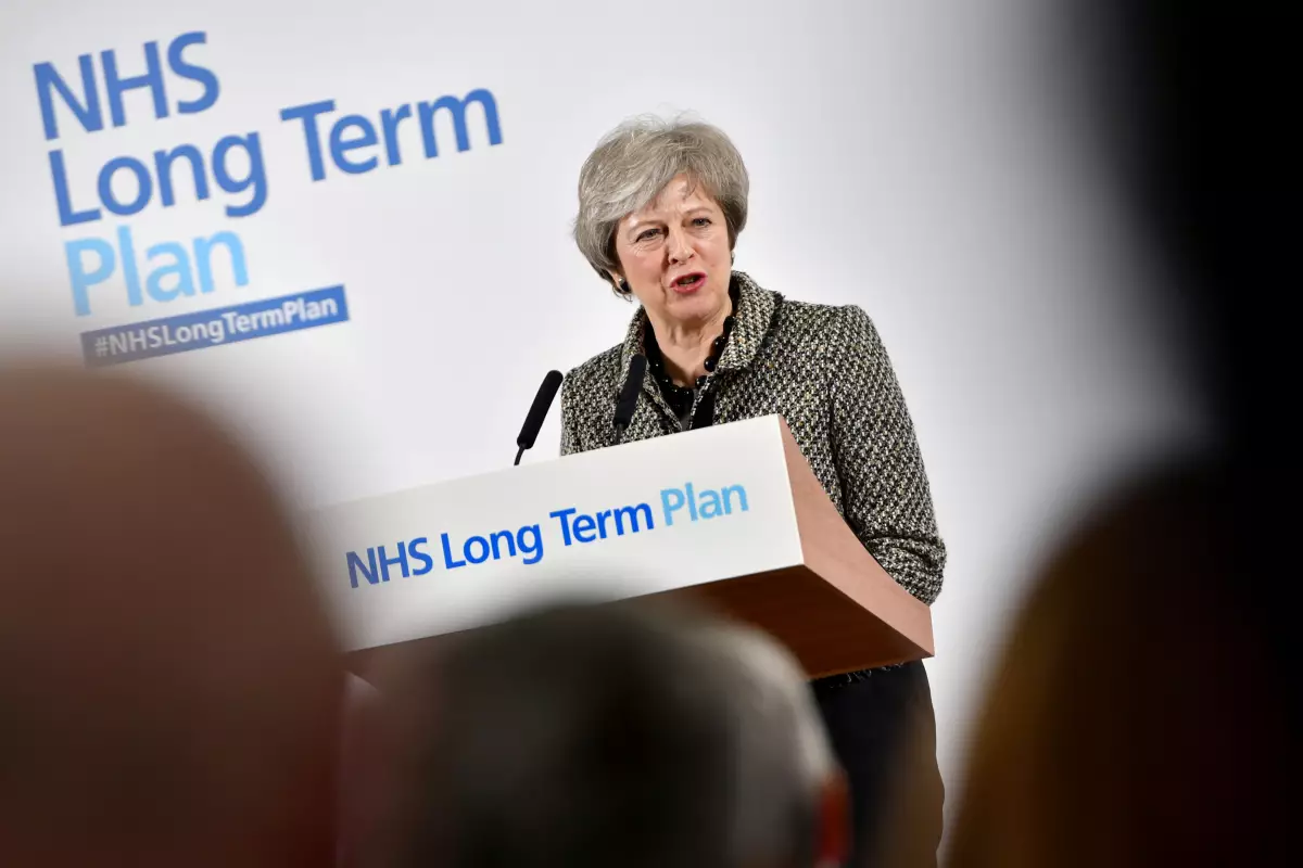 FILE PHOTO: Britain's PM May launches government's NHS Long Term Plan in Liverpool