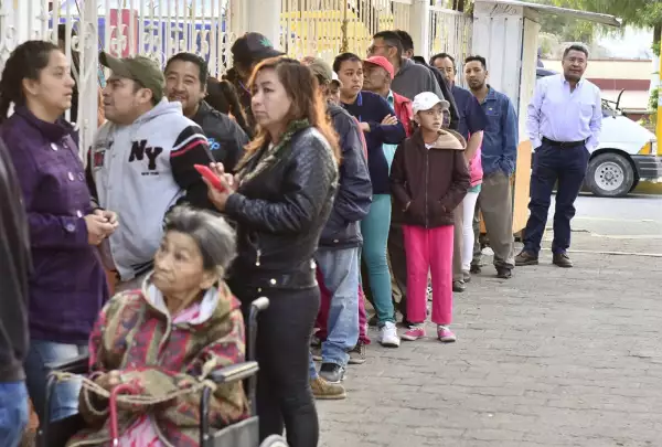 En la fila
