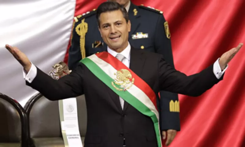El presidente Enrique Peña Nieto prometió a inversionistas extranjeros transformar el sector energético del país. (Foto: AP)