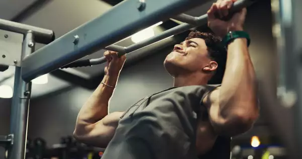 Fitness,,Man,And,Exercise,On,Pull,Up,Bar,At,Gym