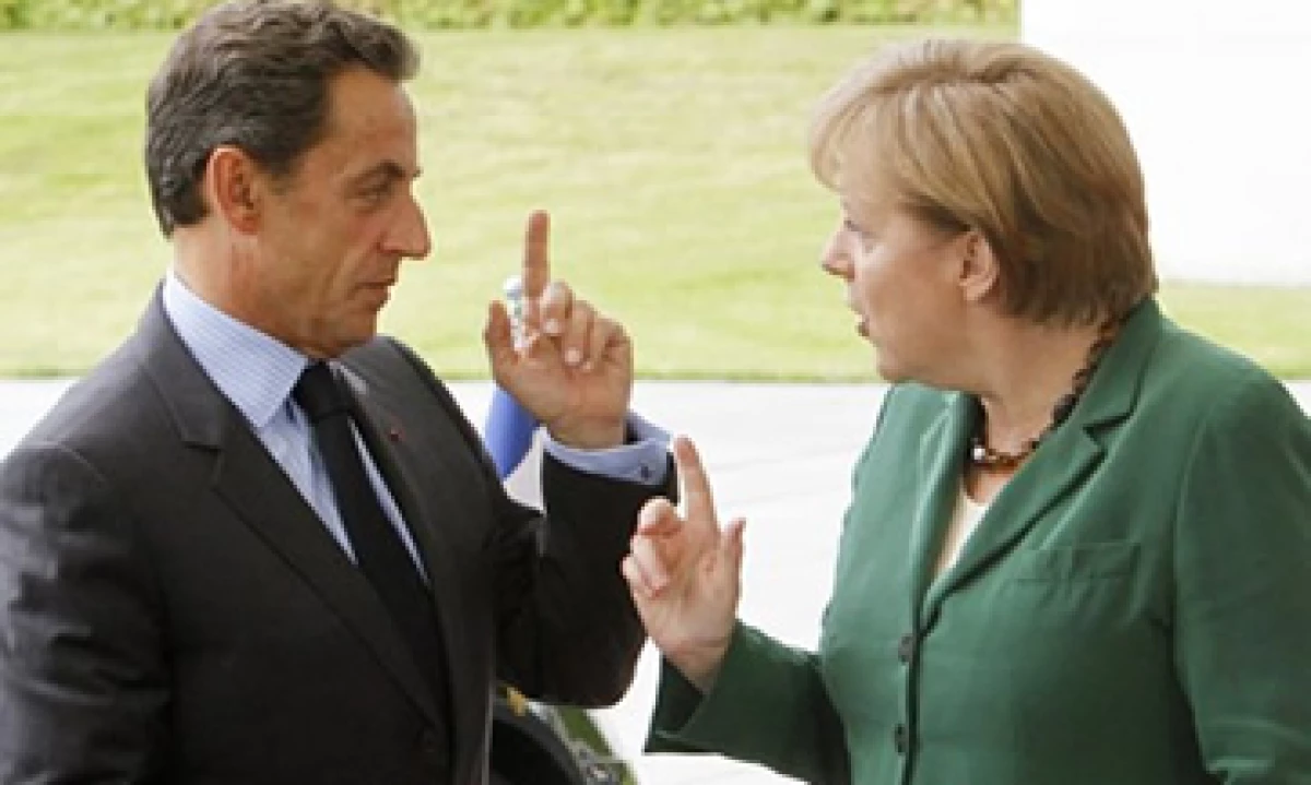 La canciller alemana, Angel Merkel y el presidente francés Nicolas Sarkozy, discuten un plan que ayude a Grecia con su deuda. (Foto: AP)