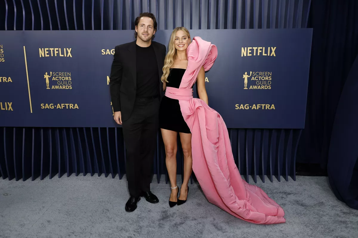 Margot Robbie y Tom Ackerley