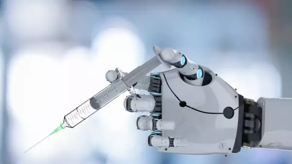 robotic hand holding syringe